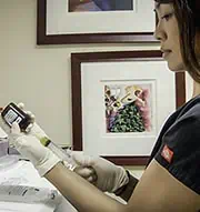 Nurse preparing an IV drip for a patient