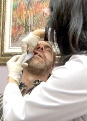 Allen receiving an ozone injection into his sinus cavity