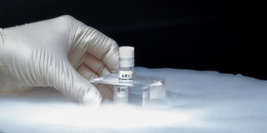A vial of stem cells being removed from cryogenic storage. 