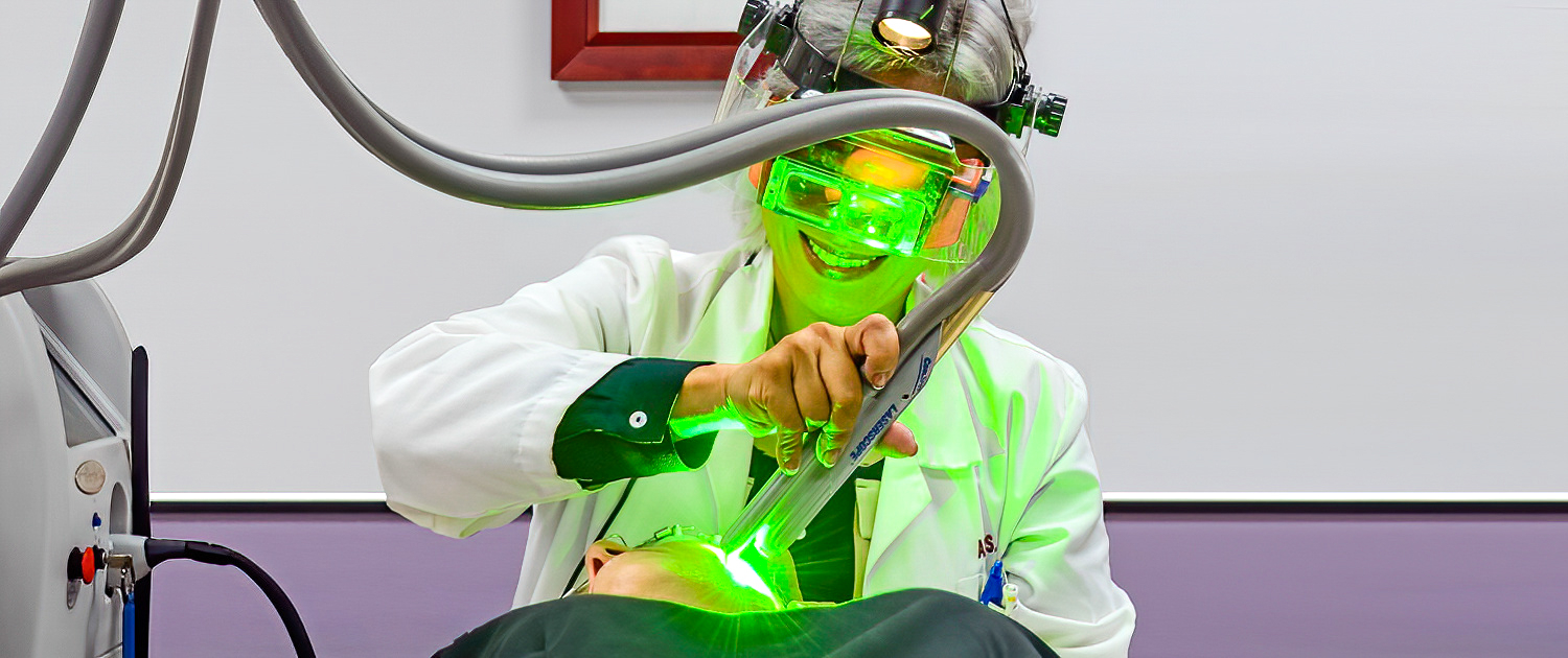 Dr. Pien performing a SpectraLift laser facelift on a patient.